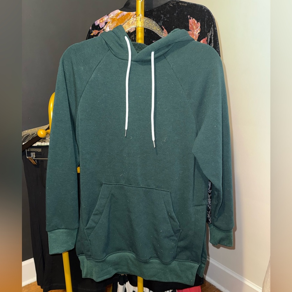 Green Hoodie with Front Pocket And Full Fleece Though out.